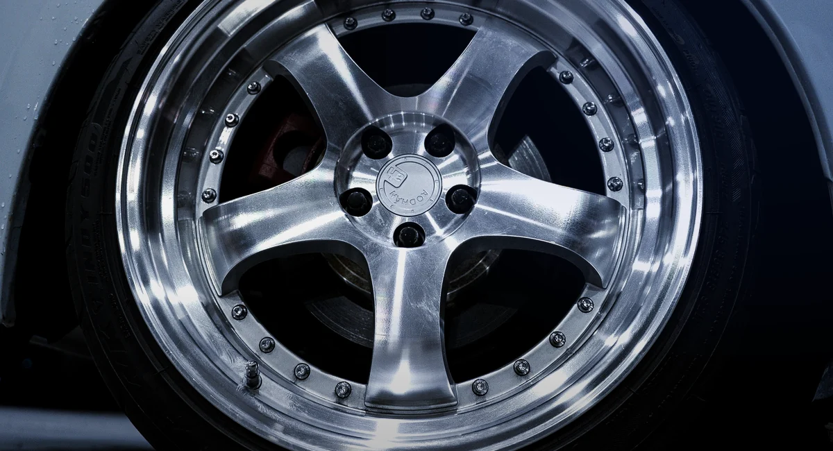 Close-up of a polished custom wheel and tire
